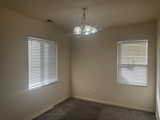 Building Photo - 4 Bedroom 3 Bath Two Story Home, New Flooring, New Interior Paint