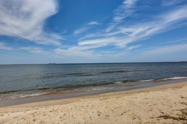 Building Photo - 3-Story Duplex in Chesapeake Beach! Ready 05-06-26! Fenced Backyard - Attached Garage - Pet Frien...