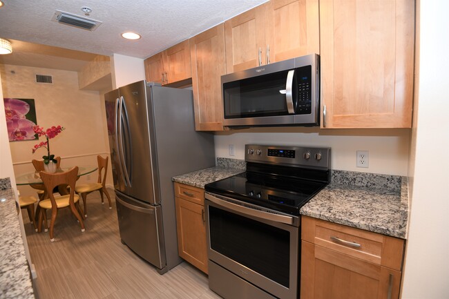 Newly updated kitchen. - 5799 NE Island Cove Way