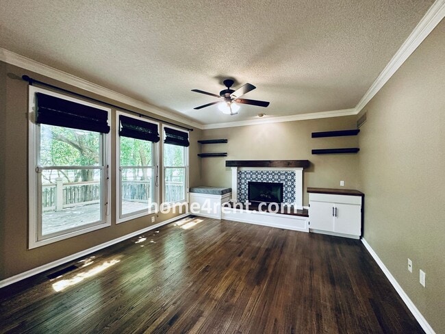 Building Photo - Blue Valley Schools w/ Wood Floors, Finished Basement and a Peaceful, Private Fenced Yard!