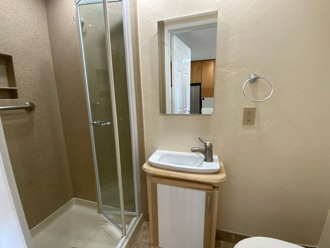 Building Photo - Long-Term Unfurnished Rental – Available N...