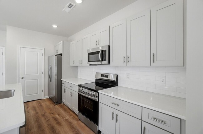 Building Photo - 4BR Home in The Pines at Paw Creek – New Construction + Private Deck