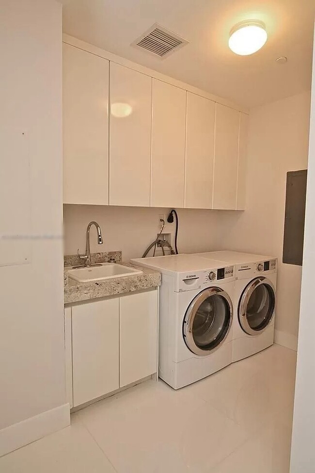 Laundry room - 9703 Collins Ave