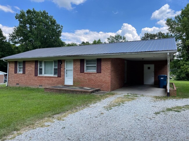 Building Photo - 3 BDRM 1 BA BRICK HOME, SINGLE CARPORT, 10...