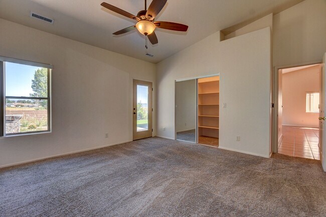 Building Photo - 5879 N Bronco Ln