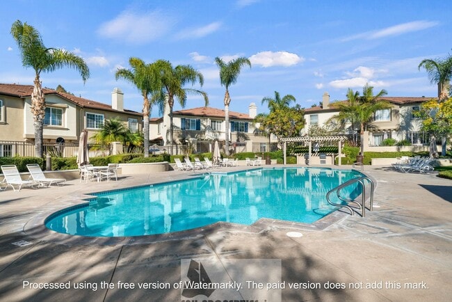 Building Photo - Welcome to this stunning 2-bedroom condo in gated community