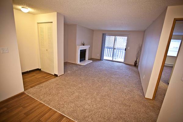 Living room w/ Wood-Burning Fireplace - Avana West Hill