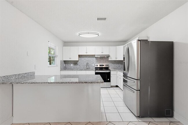 Building Photo - 7133 Pinewood Dr