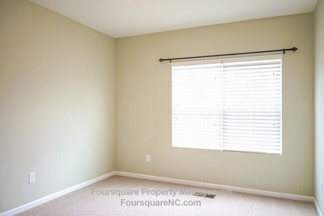 Building Photo - Charming End-Unit Townhome with Bonus Room, Screened Porch & 2-Car Garage – Convenient to RTP, RD...