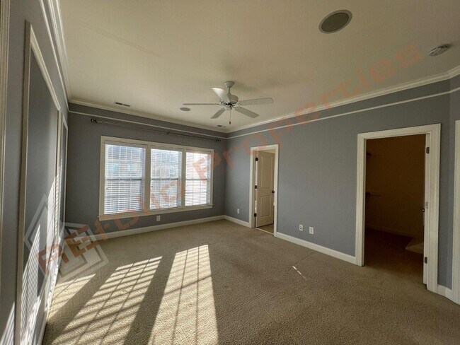 Building Photo - Elegant 3 Story 3 Bedroom Formal Model Tow...