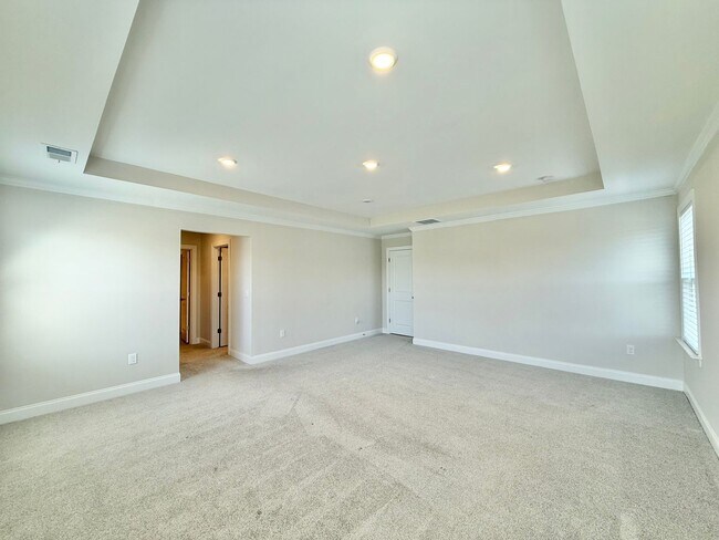 Building Photo - Luxurious 5BD, 4.5BA Holly Springs Home in an HOA Community with Resort-Style Amenities near Down...