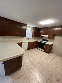Building Photo - 4705 Dahlia Ln