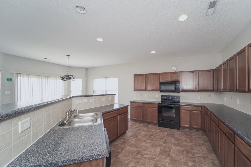 Building Photo - 13636 Coram Pl