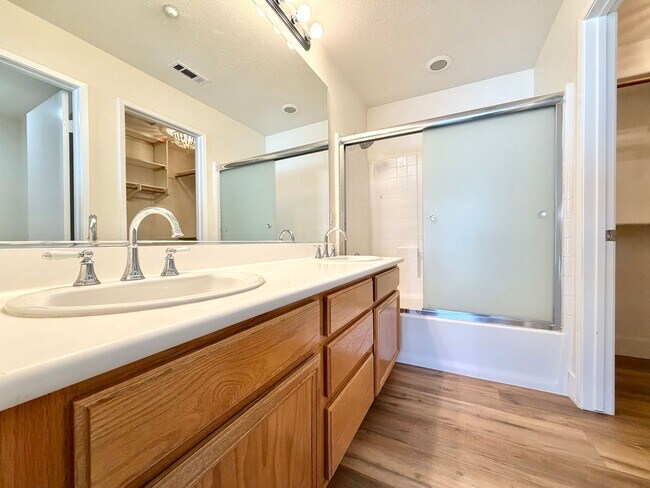 Building Photo - Stylish 2-Bedroom Condo in Gated Community with Balcony & Amenities