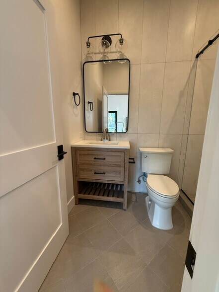 Modern bathroom with high ceilings - 1242 Mildred Ave
