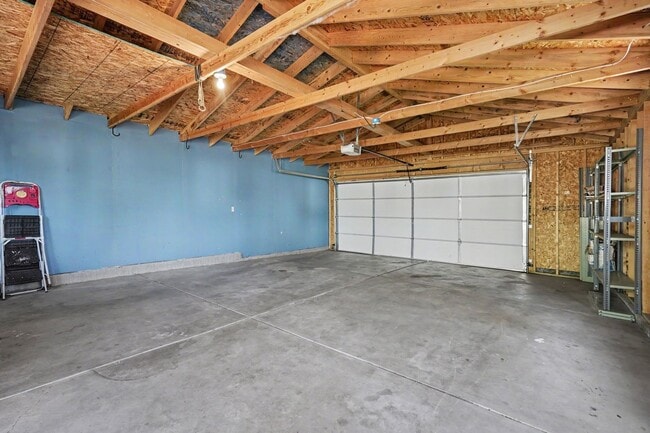 Building Photo - Spacious 4-Bedroom, 2-Bath Home with Large Yard, Garage & Central A/C