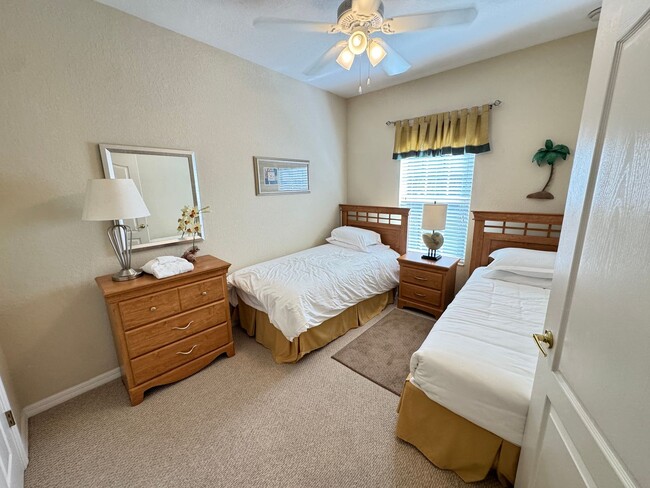 Building Photo - Fully Furnished 5-Bed End-Unit Townhome with Hot Tub in Gated Coral Cay! WASHER & DRYER INCLUDED!