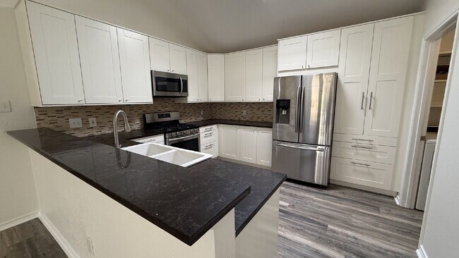 Building Photo - Updated 4-Bedroom 2 Bathroom Austin Home with Beautiful Backyard