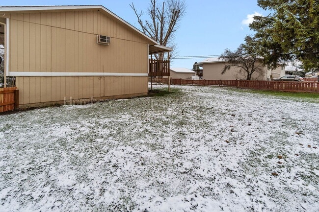 Building Photo - 10119 E Empire Ave