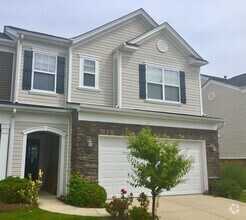 Building Photo - End Unit Townhome with Tons of Extra Storage!