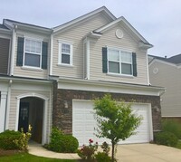 Building Photo - End Unit Townhome with Tons of Extra Storage!