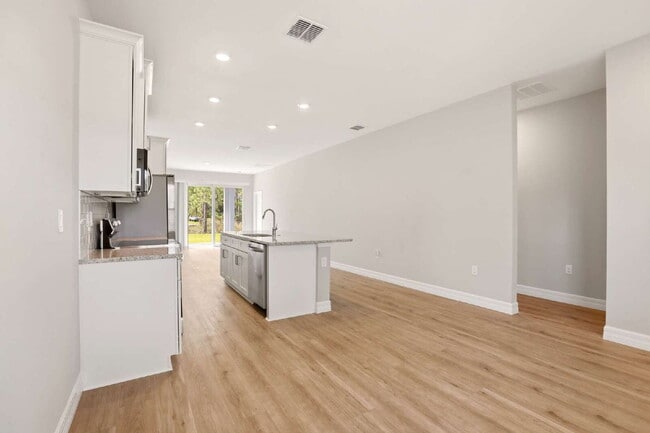 Building Photo - Brand New 4-Bedroom Gem with 2 Full Baths on Large Lot in Lehigh Acres – A Perfect Family Haven!