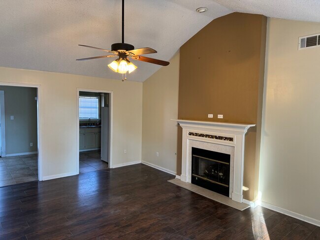 Living room with gas fireplace - 3550 Woodland Dr