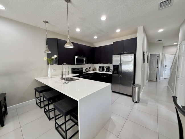 Building Photo - Furnished 3BR Townhome in Clermont