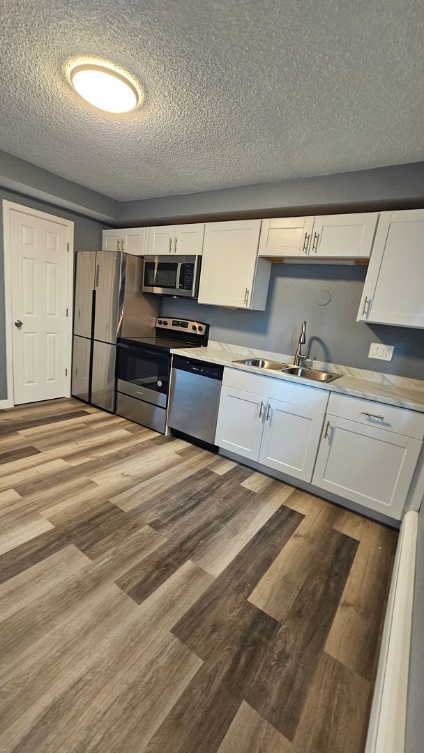Building Photo - $1195 - 2BR/1BA Pet-Friendly 4Plex near Me...