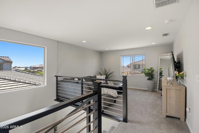 Building Photo - 9022 W San Miguel Ave