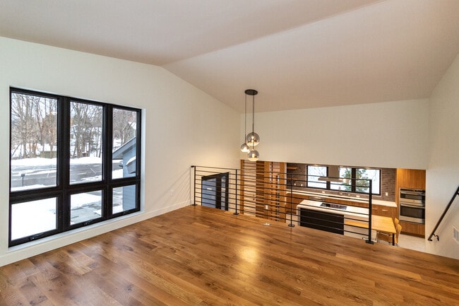 View from living room toward kitchen - 5590 Harding Ln