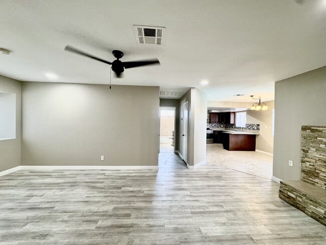 Building Photo - Spacious 4BD/3BA Pool Home with Dual Prima...