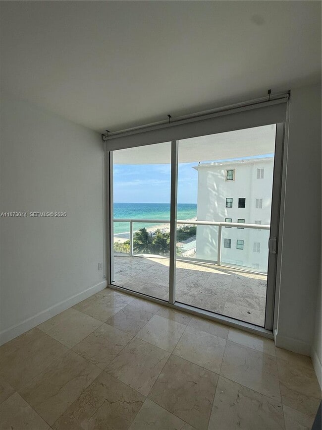 Building Photo - 6365 Collins Ave