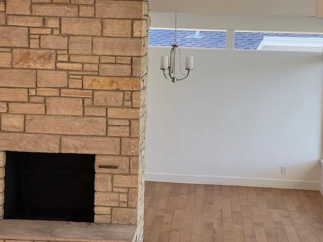 Wood-burning, gas-assisted fireplace and dining room - 2812 Anchor Ave