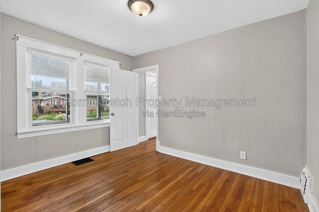 Building Photo - 9006 Baroda Ave
