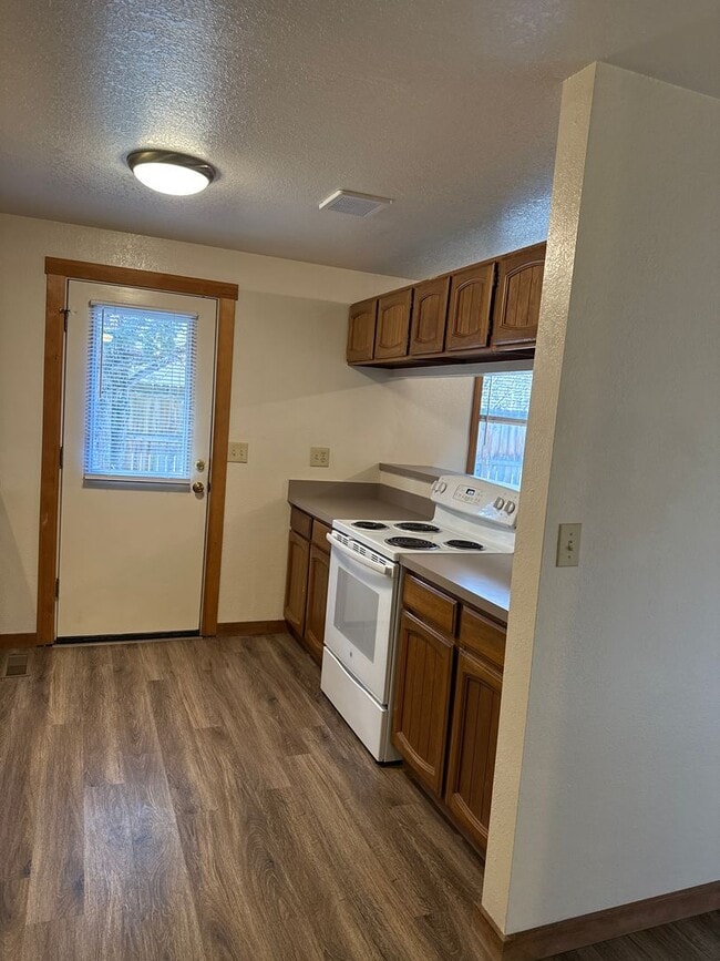 Building Photo - RV Parking, SMALL DOG OK, NE 3 Bdrm, 2 Bath House, All Appliances, Wood Stove, Dbl. Garage