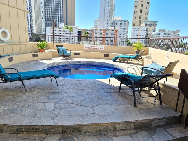 Building Photo - 2 bedroom FULLY FURNISHED Condo with Parki...