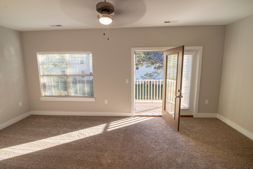 owner suite with balcony upstairs - 230 Signature Pl