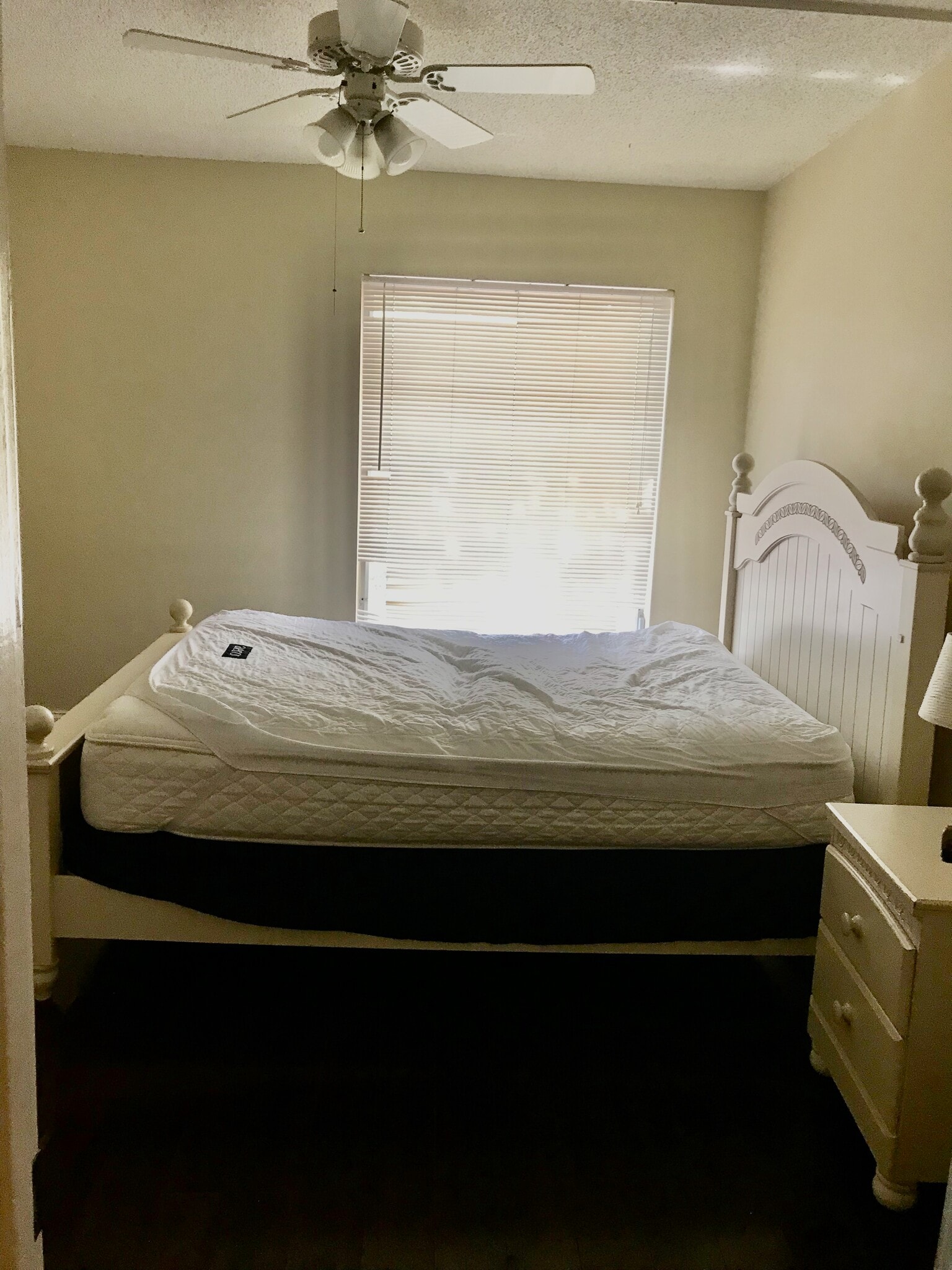 furnished bedroom with bed set - 450 NW 20th St