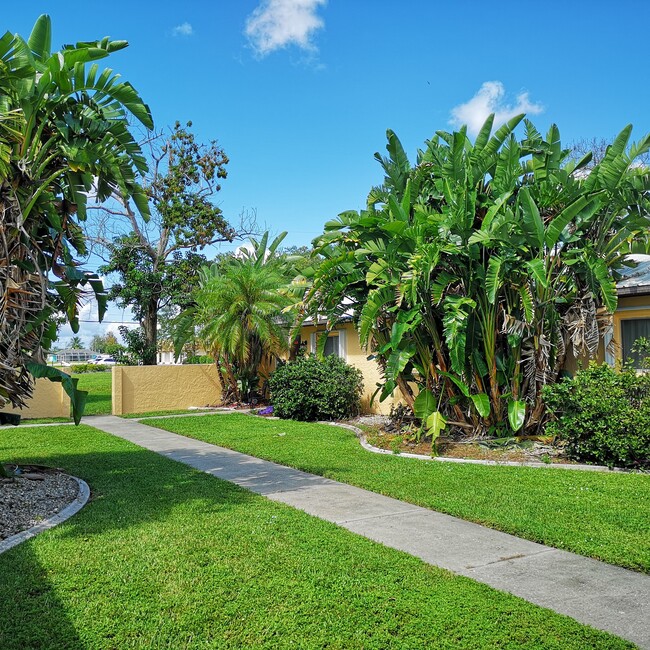 Garden style apartment setting with a front courtyard leading to each apartment - 16 SE 16th Pl