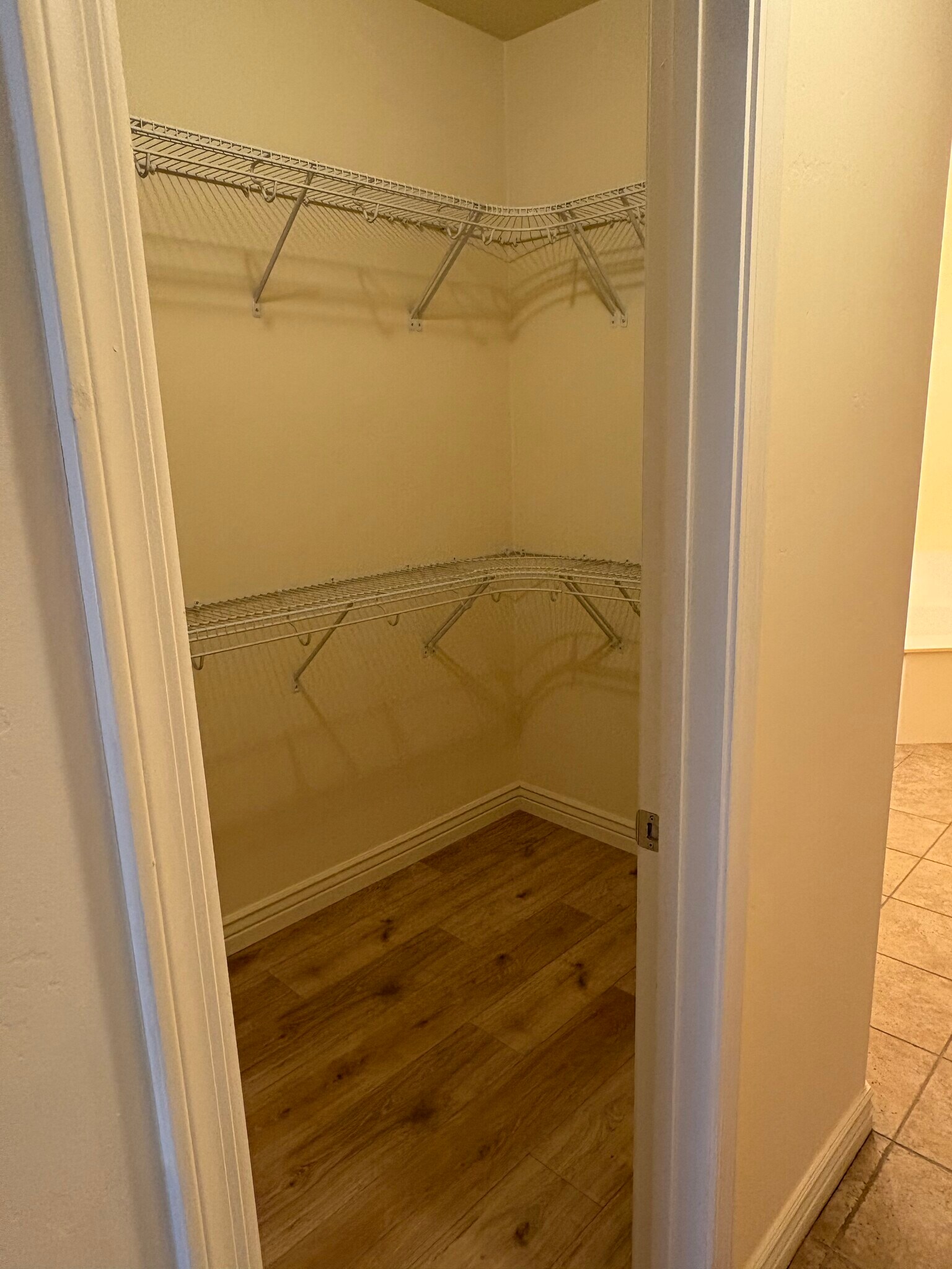 Spacious walk-in closet with organizers - 5450 E Deer Valley Dr