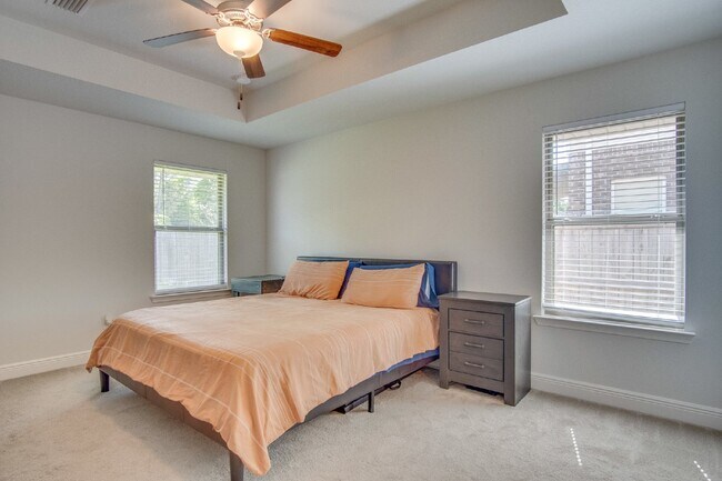 Building Photo - Spacious 4BR/2BA Brick Home with 2-Car Garage, Granite Kitchen, Vaulted Ceilings & Fully Fenced B...