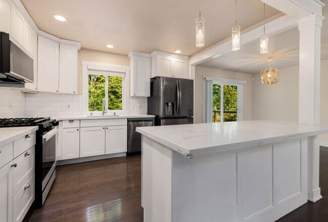 Building Photo - Updated Split-Level Home with Flexible Living Spaces & Backyard Deck