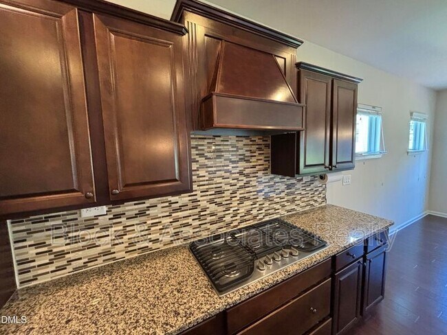 Building Photo - 1009 Magnolia Blossom Ln