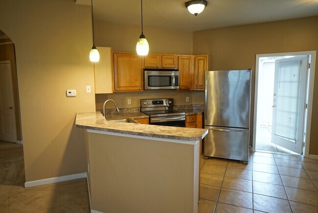 Building Photo - 2-Bed, 2-Bath, Condo with Garage in The Villas Condominiums