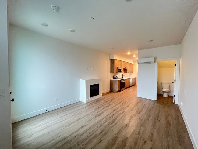 Building Photo - Modern 2-Bed, 1.5-Bath Condo with Custom Kitchen, Private Patio, and Prime Location