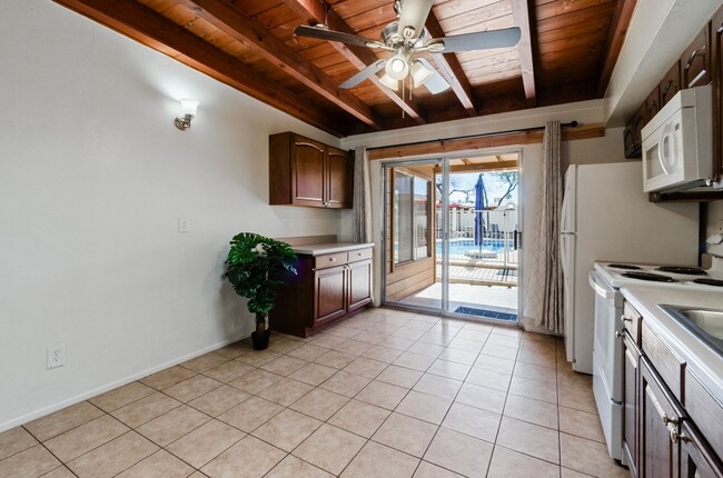 Building Photo - Available March 1, 2026. Updated 2 Bedroom 1.5 Bath Duplex with private dedicated pool.