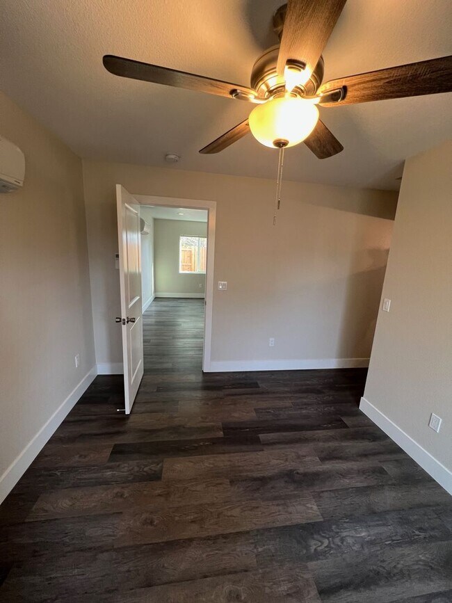 Building Photo - NEW BUILD! Beautifully designed mini home ...