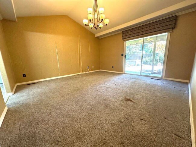Building Photo - Beautiful 3-Bedroom Home with Open Floor Plan & Private Backyard