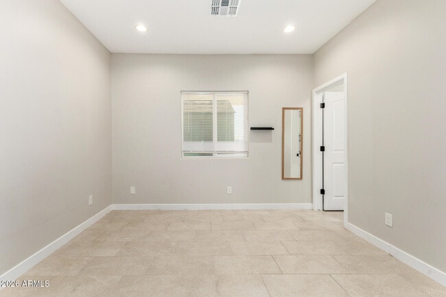 Building Photo - 10019 W Monaco Blvd